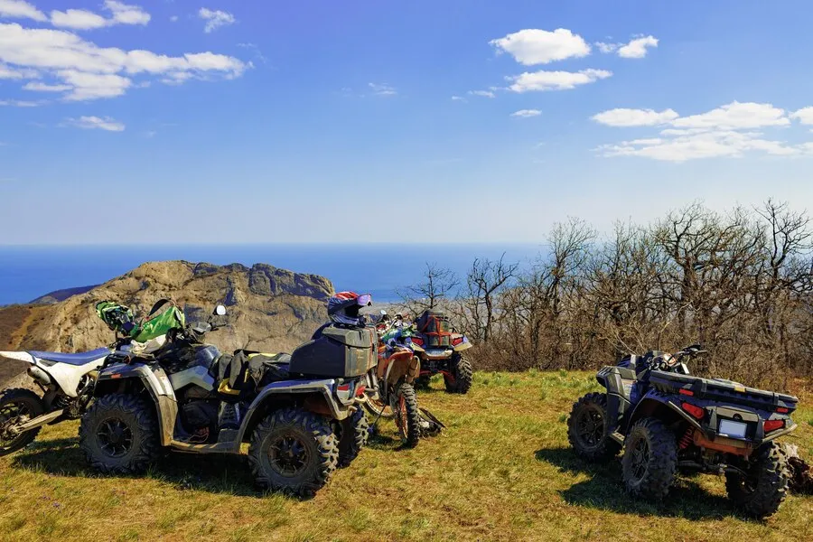 Quad ATV Cars All Terrain Vehicle Parked Mountain Road